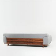 Sofá Tara dos plazas para Artisan en madera maciza a elegir, con diseño exclusivo y vanguardista de Michael Schneider