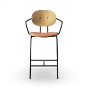 Silla bar del diseñador danés Piet Hein con reposabrazos en madera maciza y asiento tapicería de máxima calidad para Sibast