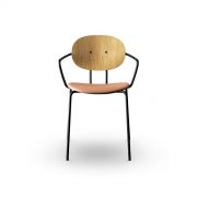 Silla del diseñador danés Piet Hein en 1968, con reposabrazos en madera y tapicería de máxima calidad para Sibast
