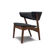 Sillón salón respaldo tapizado Sibast No 7 se fabrica en Europa por Sibast. Original del artista Ditlev Sibast en madera y tapicería a elegir