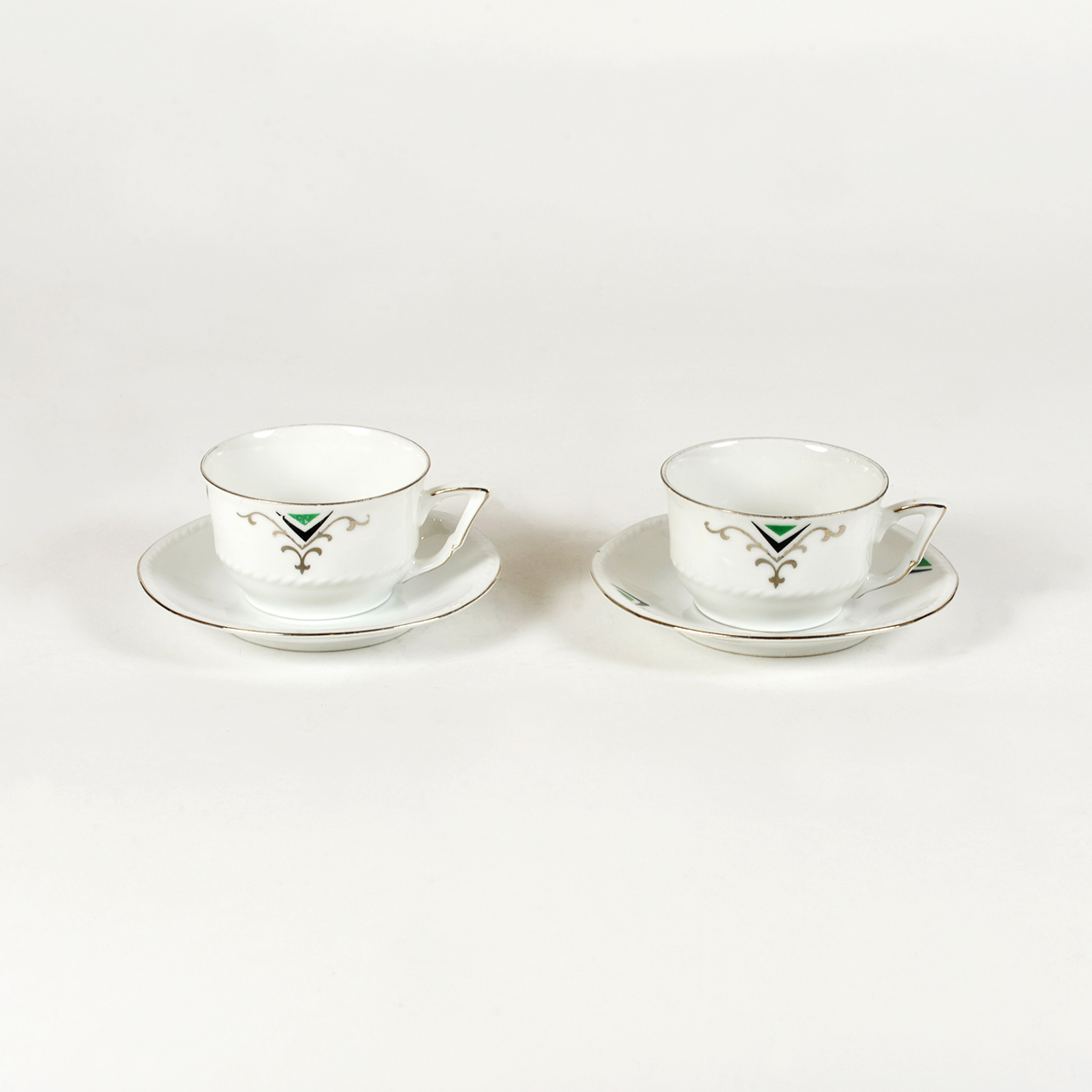 Juego de dos tazas y dos platos, diseño Art decó