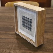 Amparo de la Sota. Bordado a mano #155. Obra enmarcada en roble.