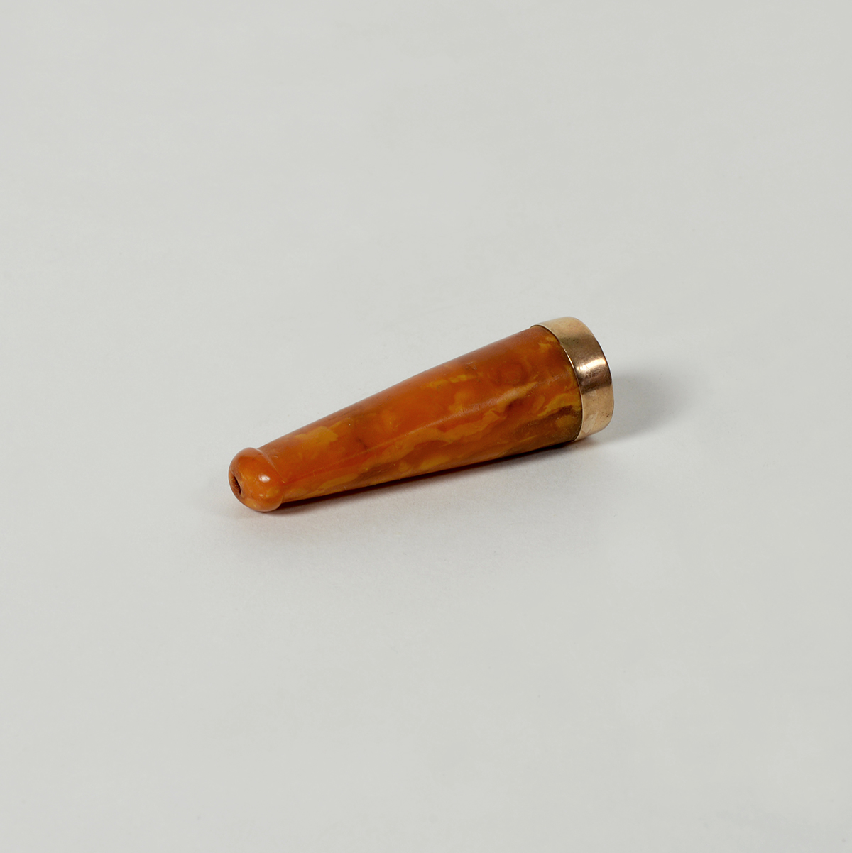 Boquilla de ámbar y oro
